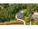 Expansive property with a large home, circular driveway, and in-ground pool at 14013 Wallberman Dr, Wake Forest, NC 27587