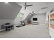 Large bonus room with workout equipment, a seating area, and a window for natural light at 14013 Wallberman Dr, Wake Forest, NC 27587