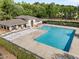 Community pool with abundant lounge chairs and covered pavilion offers a great place to relax at 141 Hilda Grace Ln, Cary, NC 27519