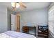 Comfortable bedroom offering plenty of space, a ceiling fan, and a practical desk area by the window at 141 Montesino Dr, Raleigh, NC 27603