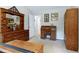 Comfortable bedroom featuring wooden furnishings, a neutral color scheme, and natural light for a relaxing atmosphere at 141 Montesino Dr, Raleigh, NC 27603