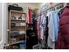 Organized walk-in closet with shelving, hanging racks, and ample storage space for clothes and personal items at 141 Montesino Dr, Raleigh, NC 27603