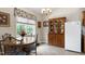 Bright dining area with a wooden table, chairs, and ample natural light at 141 Montesino Dr, Raleigh, NC 27603