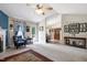 Spacious living room with a fireplace, and open access to dining area at 141 Montesino Dr, Raleigh, NC 27603