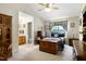 Spacious main bedroom featuring vaulted ceiling, a large bed, and en-suite bathroom with convenient access at 141 Montesino Dr, Raleigh, NC 27603