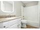 Bathroom featuring a shower and tub combination and a granite countertop vanity at 1429 Raybon Dr, Wendell, NC 27591