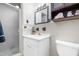 Cozy bathroom featuring a walk-in shower, white vanity, and classic tilework, offering a clean and functional space at 149 Baldwin Dr, Durham, NC 27712