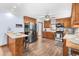 Traditional style kitchen with wooden cabinets, stainless steel appliances, and a breakfast bar at 149 Baldwin Dr, Durham, NC 27712