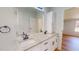 Double vanity bathroom featuring granite countertop and modern fixtures at 1622 Julian Oakley Rd, Rougemont, NC 27572