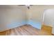 Empty bedroom featuring vinyl floors and neutral colored walls and ceiling fan at 1622 Julian Oakley Rd, Rougemont, NC 27572