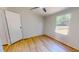 Bright bedroom featuring a view of the outside and vinyl floors at 1622 Julian Oakley Rd, Rougemont, NC 27572
