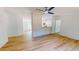 Open-concept living space with wood-look floors and view of the kitchen at 1622 Julian Oakley Rd, Rougemont, NC 27572