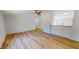 Spacious living room with wood-look floors, neutral walls and ceiling fan at 1622 Julian Oakley Rd, Rougemont, NC 27572
