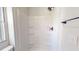 Shower stall featuring built in shelves and bronze hardware at 1622 Julian Oakley Rd, Rougemont, NC 27572