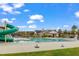 Community pool with a large slide and splash area, alongside a clubhouse, perfect for Gathering fun at 1811 Sandoval Dr, Durham, NC 27703