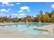 Large community pool with multiple lap lanes, a splash area, and comfortable lounge seating at 1811 Sandoval Dr, Durham, NC 27703
