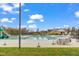 Community pool with ample seating, lap lanes, and a view of the clubhouse on a bright day at 1811 Sandoval Dr, Durham, NC 27703