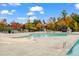 Zero entry community pool with sand area, sun loungers, and wading area at 1811 Sandoval Dr, Durham, NC 27703