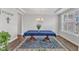 Bright dining room with a large window, area rug, and elegant light fixture at 1811 Sandoval Dr, Durham, NC 27703