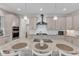 Gourmet kitchen with granite counters, stainless steel appliances, and a large island at 1811 Sandoval Dr, Durham, NC 27703