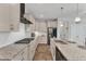 Spacious kitchen with granite countertops, stainless steel appliances, and white cabinets at 1811 Sandoval Dr, Durham, NC 27703