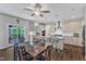 Modern kitchen featuring an island with bar seating, stainless steel appliances, and outside access at 1811 Sandoval Dr, Durham, NC 27703