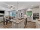Bright, open kitchen with granite island and seamless access to dining and living areas at 1811 Sandoval Dr, Durham, NC 27703