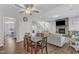 Open concept living and dining area with fireplace and access to the upper level at 1811 Sandoval Dr, Durham, NC 27703