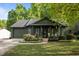Inviting home exterior with well-maintained landscaping and a welcoming entrance at 1820 Collier Rd, Durham, NC 27707