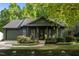 Charming home with a well-maintained front yard and beautiful landscaping at 1820 Collier Rd, Durham, NC 27707