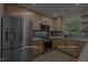 Modern kitchen featuring stainless steel appliances and soft close cabinetry at 1820 Collier Rd, Durham, NC 27707
