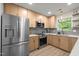 Modern kitchen featuring stainless steel appliances and soft close cabinetry at 1820 Collier Rd, Durham, NC 27707