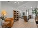 Tastefully decorated living room with neutral colors, hardwood floors, and natural lighting at 1820 Collier Rd, Durham, NC 27707