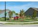 Beautiful community garden with benches, raised plots, and manicured lawns for residents to enjoy at 199 Telluride Trl, Garner, NC 27529