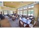 Spacious dining area with ample seating, lots of natural light, and neutral decor for community gatherings at 199 Telluride Trl, Garner, NC 27529