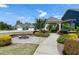 Outdoor area with a fire pit, sidewalk and landscaping for a relaxing evening or gathering with neighbors at 199 Telluride Trl, Garner, NC 27529