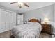 Comfortable bedroom with ceiling fan and large closet for ample storage at 2005 Chalybeate Springs Rd, Fuquay Varina, NC 27526