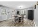 Charming dining room with hardwood floors, natural light, and seating for six at 2005 Chalybeate Springs Rd, Fuquay Varina, NC 27526