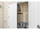 An open storage area featuring essential utilities and various paint supplies neatly organized at 225 Gulley Glen Dr, Garner, NC 27529