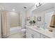 Clean bathroom featuring a vanity, tub/shower combination, and neutral-toned fixtures for a relaxing atmosphere at 2323 Big Sky Ln, Raleigh, NC 27615
