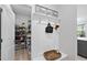 Convenient mudroom entry space with built-in bench, storage, and access to the pantry at 2323 Big Sky Ln, Raleigh, NC 27615