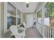 Relaxing screened porch with comfortable rocking chairs and ceiling fan at 2323 Big Sky Ln, Raleigh, NC 27615