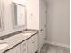 Bathroom features a dual sink vanity with granite counters and chrome hardware at 2472 Patriot Bluffs Dr, Fuquay Varina, NC 27526