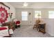 Bright bedroom featuring comfortable seating and a neutral color palette at 253 Sweet Olive St, Clayton, NC 27527
