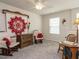 Cozy bedroom with comfortable seating and a large, decorative wall hanging at 253 Sweet Olive St, Clayton, NC 27527