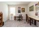 Sunny bedroom with a sewing machine and ample table space at 253 Sweet Olive St, Clayton, NC 27527