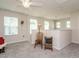 Bonus room featuring carpet flooring, neutral walls, decor, natural light, and windows at 253 Sweet Olive St, Clayton, NC 27527