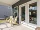 Outdoor patio with comfortable seating and easy access to the backyard at 253 Sweet Olive St, Clayton, NC 27527