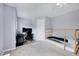This bedroom features neutral carpet and a modern bed frame at 2639 Oleander Dr, Durham, NC 27703