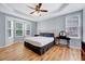 Comfortable main bedroom with bay window, hardwood floors, and plenty of natural light at 2639 Oleander Dr, Durham, NC 27703